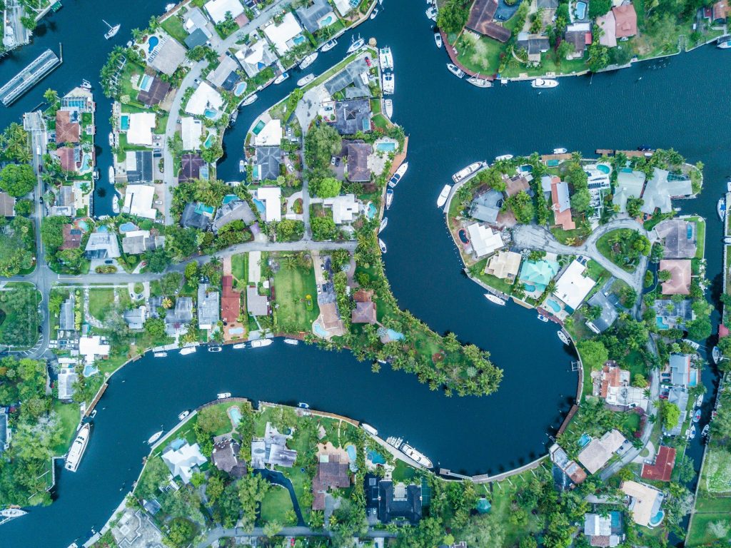 Fingers of canal between waterfront gardens, straight down from the air