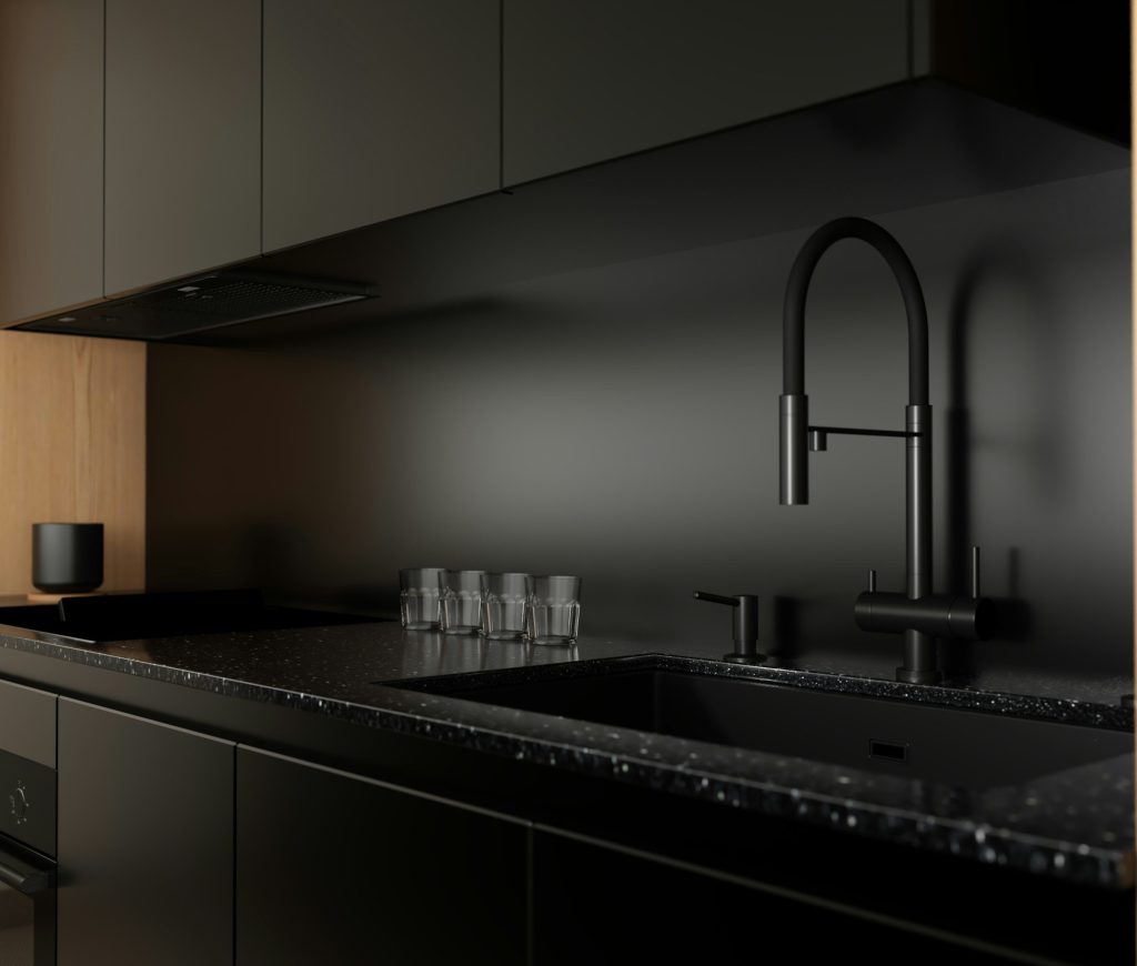 A dark matte kitchen run with a black sink and a concealed extractor