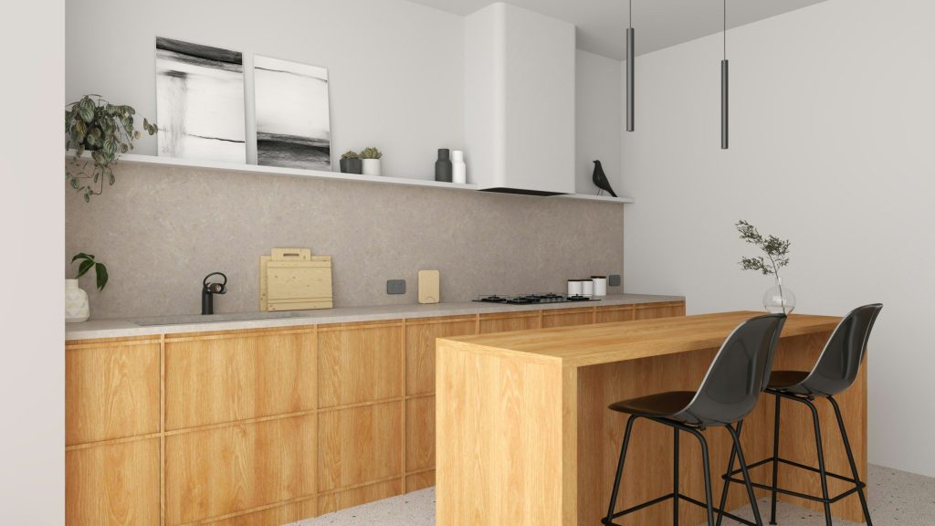 A bright oak galley kitchen with a gas hob and a breakfast bar